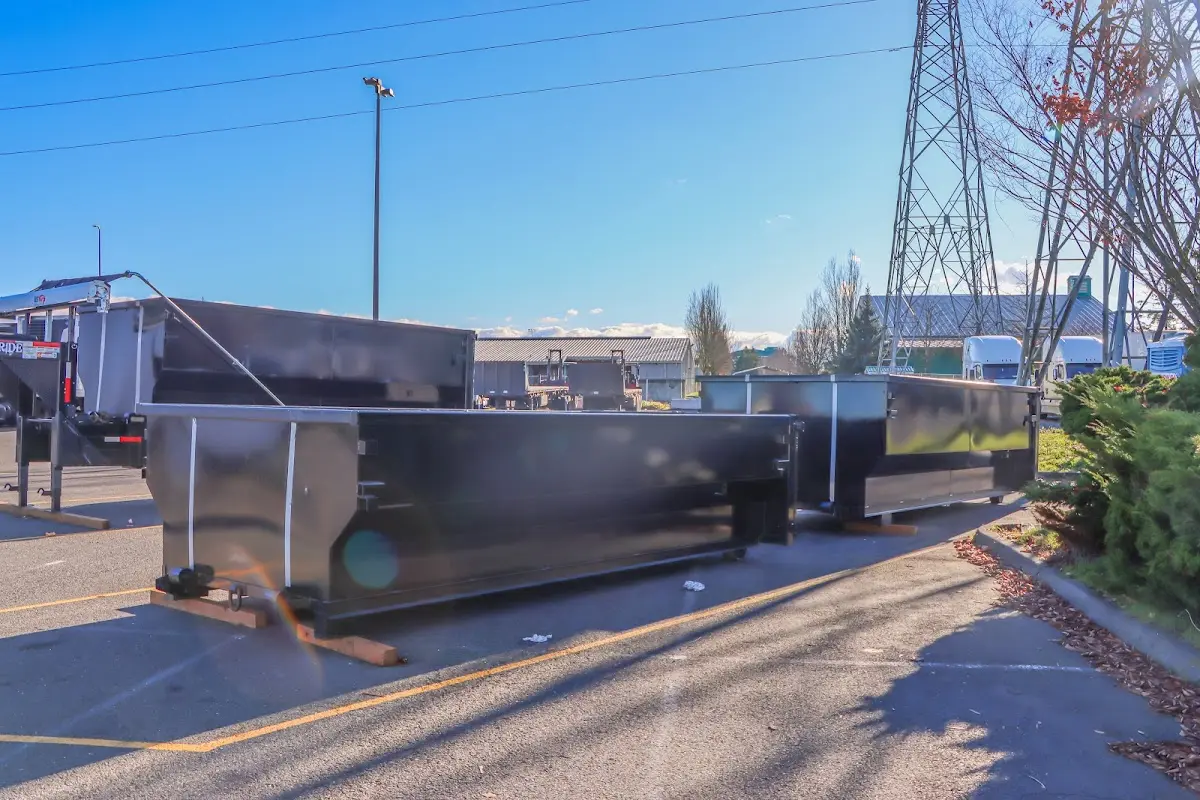 Roll-off dumpster ready for waste disposal at job site for Commercial Dumpster Rental in Addis